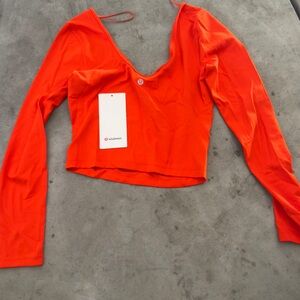 lululemon athletica Orange Long Sleeve Cropped Top